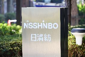 Nisshinbo Holdings Inc. signage and logo